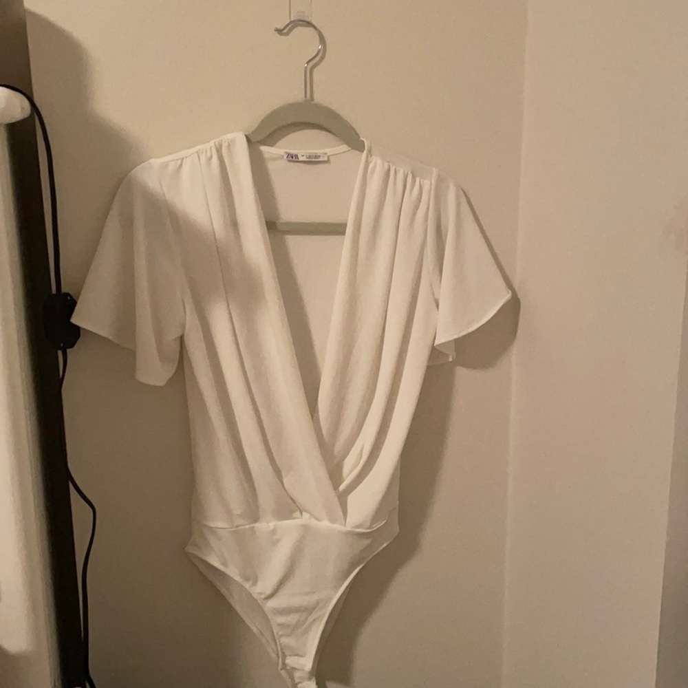 White flowy body suit
